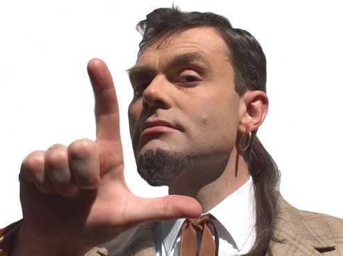 Neil Mullarkey as L Vaughan Spencer 'Don't be Needy, Be Succeedy'